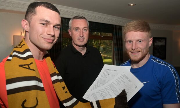 Forres Mechanics manager Steven MacDonald, centre, with new signings Aidan MacDonald, left, and Calum Howarth. Pictures by Sandy McCook