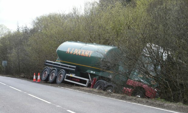 The tanker left the A82 Inverness to Fort William road and crashed down a ditch near Torlundy. Image: Sandy McCook/ DC Thomson.