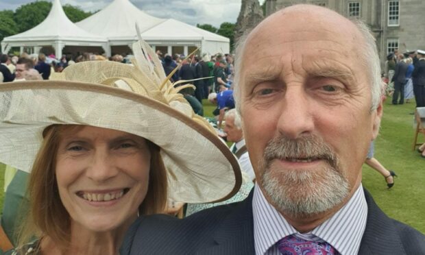 John Anderson was among the community heroes invited to the coronation. He travelled to London with his wife Margaret - here they are pictured at a previous royal garden party.
Image: John Anderson/PA Wire