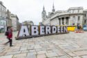 Aberdeen giant letters have popped up in Castlegate. Image: Scott Baxter/DC Thomson.