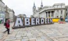 Aberdeen giant letters have popped up in Castlegate. Image: Scott Baxter/DC Thomson.