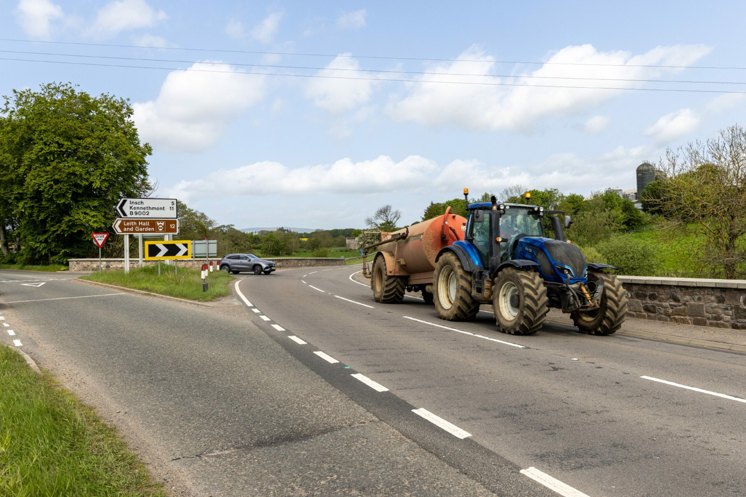 A tractor at the Oyne Fork on the major road.