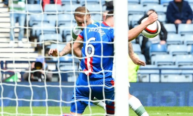 The moment where Leigh Griffiths' shot struck Josh Meekings' hand in the 2015 Scottish Cup semi-final. Image: SNS