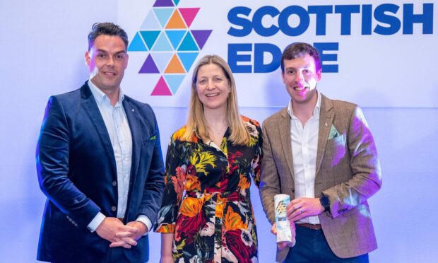 Iain Taylor and Rory Fraser, of Scottish Edge award winner Chorus Training, with Judith Cruickshank, of Royal Bank of Scotland