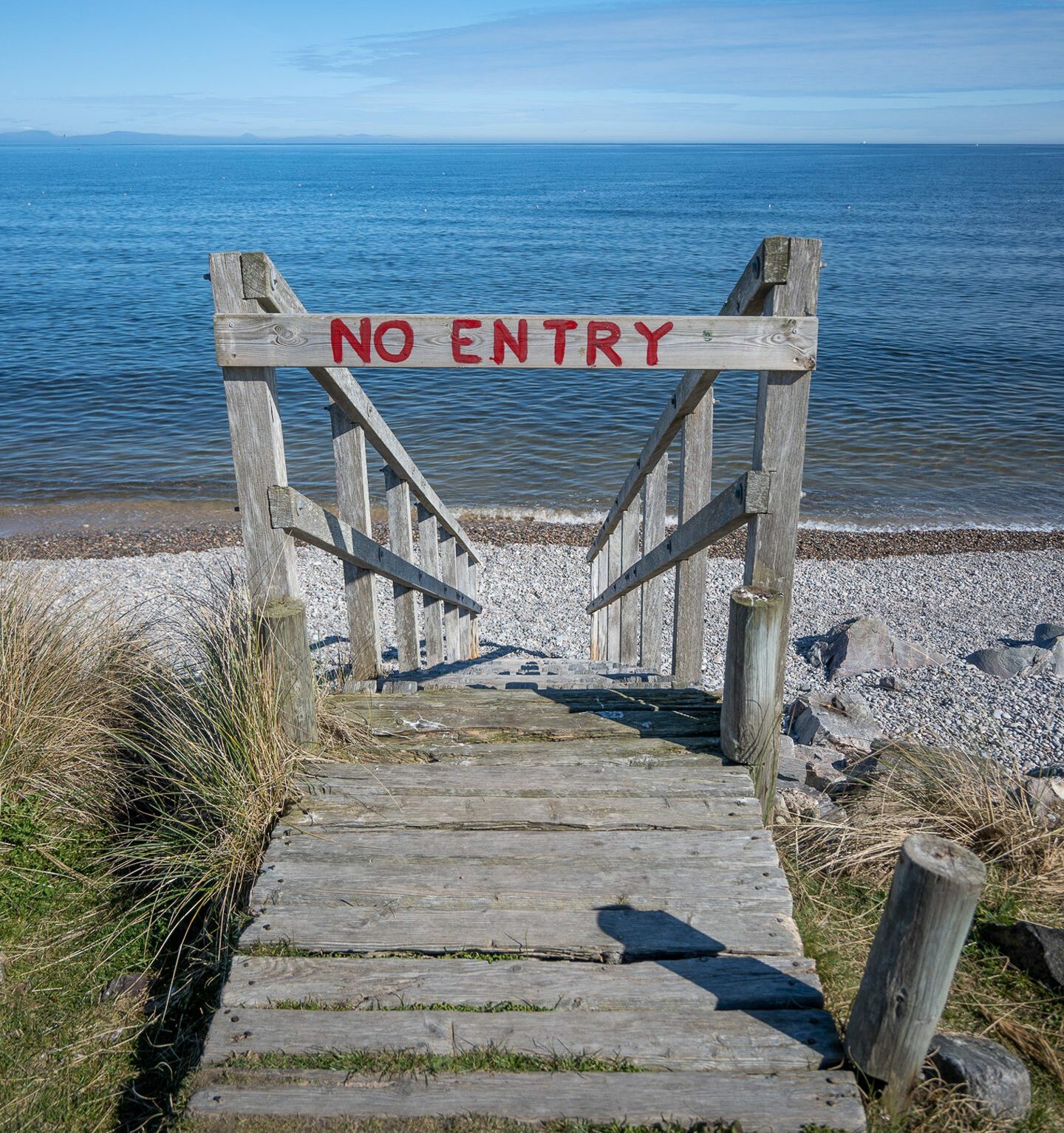 A set of steps to Findhorn beach sealed off due to safety concerns.