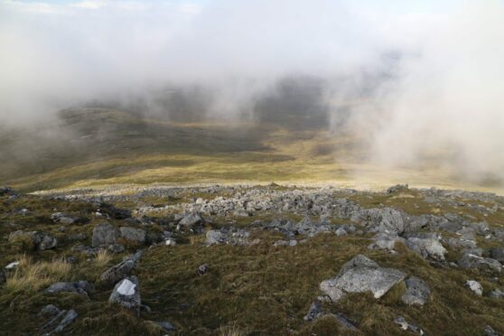 A still from the film Stravaig, showing mist over a Hebridean landscape.