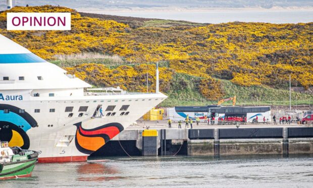 The cruise ship AIDAaura entering South Harbour in Aberdeen (Image: Wullie Marr/DC Thomson)
