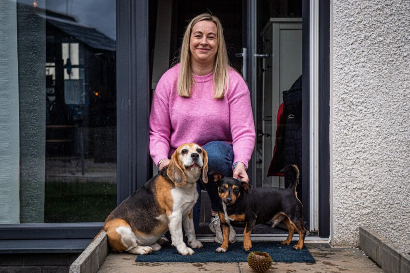 Rachael Glennie with her two dogs.