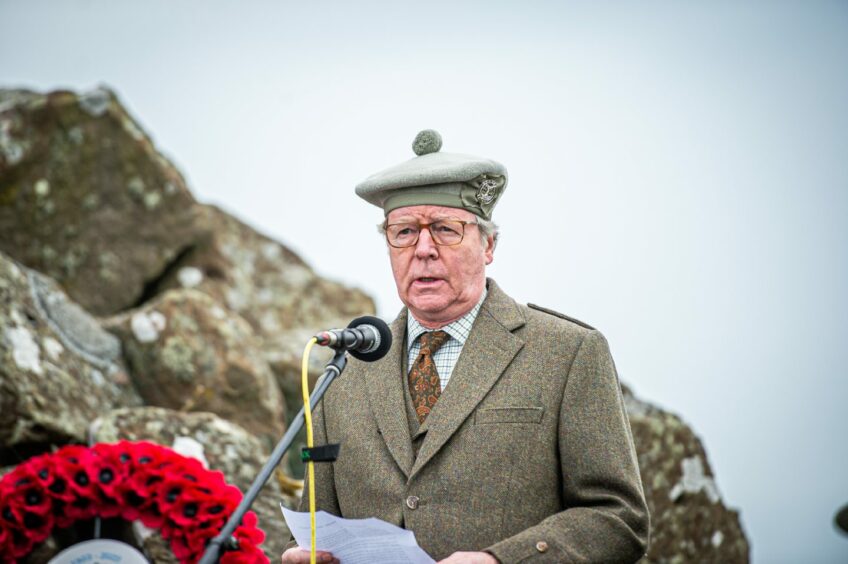 The Hon. Charles A Pearson giving a speech in uniform 