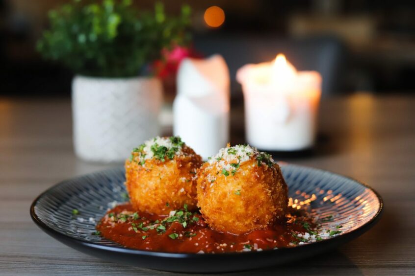Crispy Arancini balls served with a rich tomato sauce at Ardennan House.