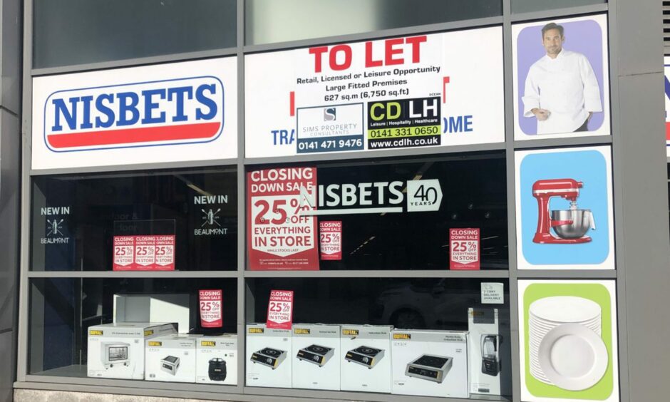Nisbits Aberdeen store with closing down sale signs in the windows