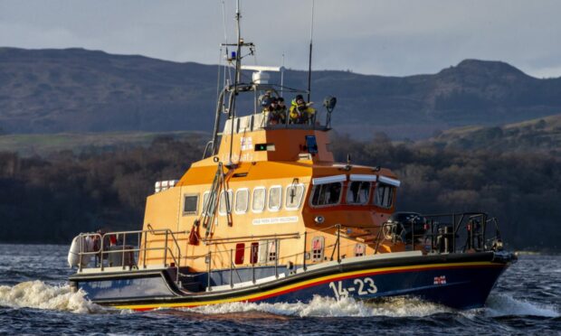 Oban Lifeboat on the water in the sun.