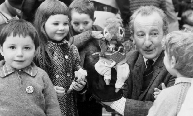 Road safety ambassadors Jim Gentleman and Tufty the squirrel paid a visit to Aberdeen's young Tufty Club members Robert McKendrick, Adelle Cummings and Norman Smith in May 1973. Image: DC Thomson