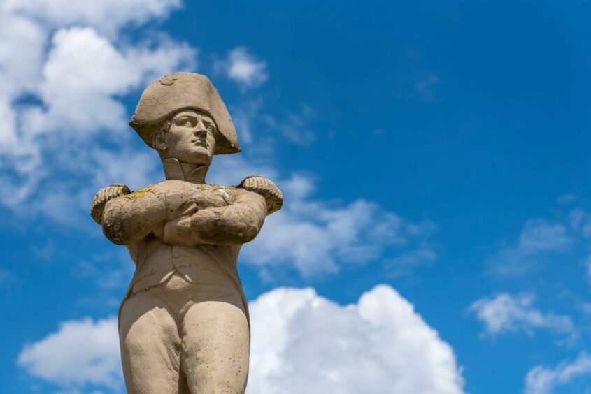 A statue of Napoleon at Waterloo, where the French emperor surrendered. Anti-poverty convener Christian Allard did not abdicate over Big Noise Torry, telling councillors "I intend to stay". Image: Kurt Vansteelant/Shutterstock.