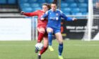 Aberdeen's Donna Paterson comes up against Spartans' Becky Galbraith. Image: Shutterstock.