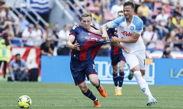 Bologna's Lewis Ferguson and Napoli's  Amir Rrahmani in action in a Serie A match.Image: Shutterstock