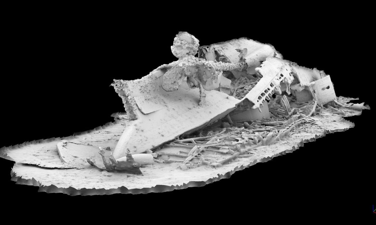 Black and white 3D model showing twisted remains of HMS Hampshire on seabed. 