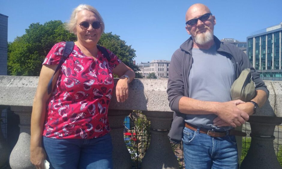 Tourists Elke and Edgar were waiting for their bus back to the Amera cruise ship when we asked their thoughts on the city centre. Image: Joshua Pizzuto-Pomaco/DC Thomson