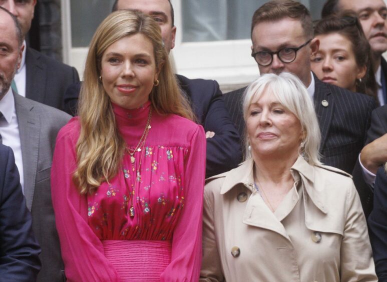 Nadine Dorries stands beside Boris Johnson's wife Carrie 