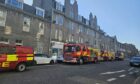 Around a dozen firefighters were seen outside a property on King Street in Aberdeen. Image: Lauren Taylor/ DC Thomson.