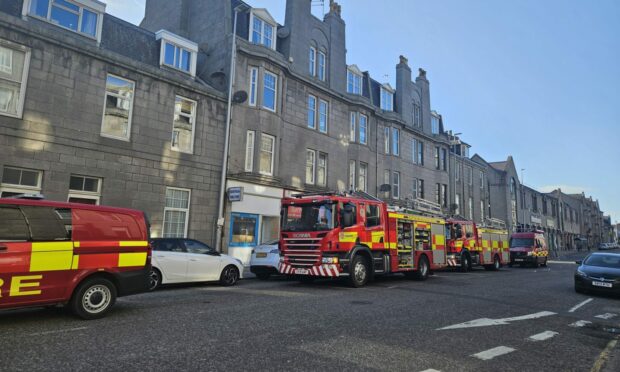 Around a dozen firefighters were seen outside a property on King Street in Aberdeen. Image: Lauren Taylor/ DC Thomson.