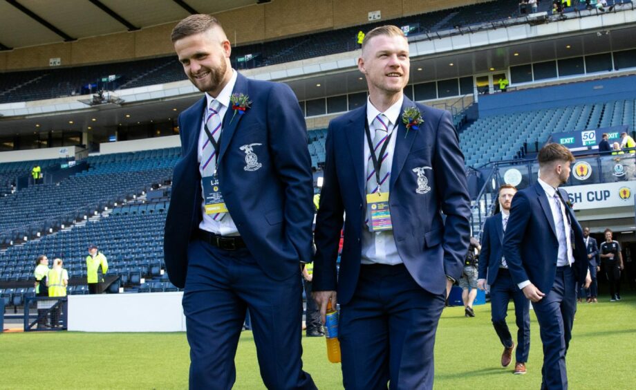 Danny Devine arriving at Hampden with ICT team-mate Billy Mckay.