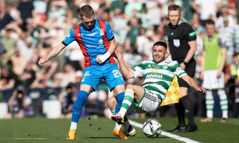 Jay Henderson is challenged by Celtic's Greg Taylor in the Scottish Cup final.