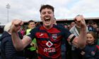 George Harmon celebrates Ross County's play-off win against Partick Thistle. Image: SNS