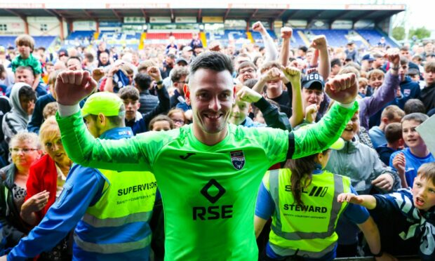 Ross Laidlaw celebrates Ross County's play-off victory over Partick Thistle. The Staggies' number one saved two shoot-out spot-kicks to help defeat the Jags. Image: SNS