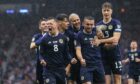 Scotland's Callum McGregor celebrates after making it 1-0 against Georgia. Image: SNS