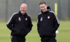 Barry Robson (R) and Neil Simpson during an Aberdeen training session at Cormack Park, on June 29, Image: SNS