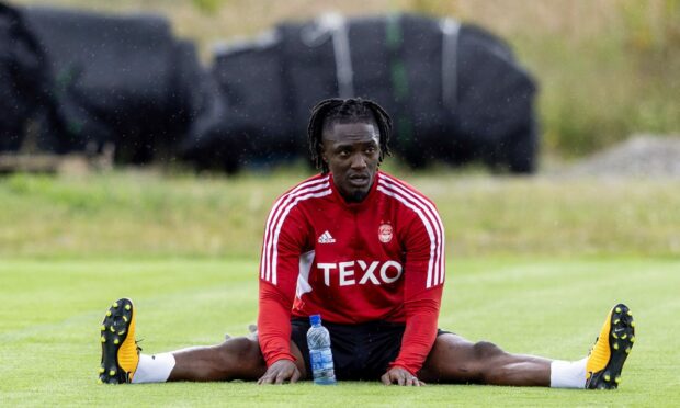Anthony Stewart stretches during an Aberdeen training session at Cormack Park, on June 29, Image: SNS