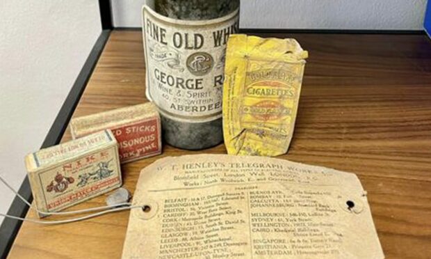 A whisky bottle that was found underneath the floorboards of an Aberdeen property.