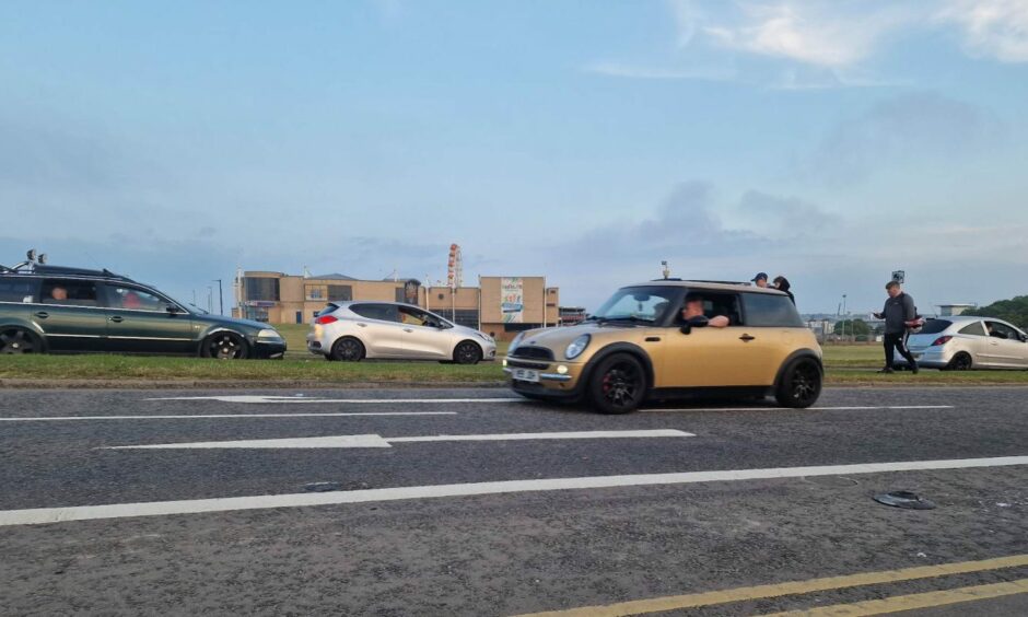 Cars at Aberdeen beach during a meet up in June 2023.