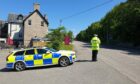 Police on patrol in the Highlands.