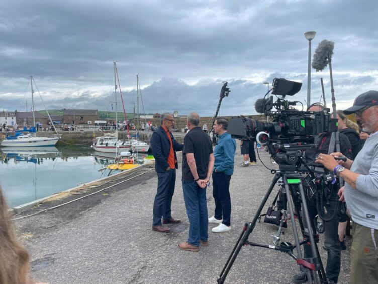 Filming crews near the Stonehaven Harbour.
