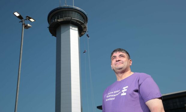 Adrian Milne did the Aberdeen Abseil in memory of his sister.