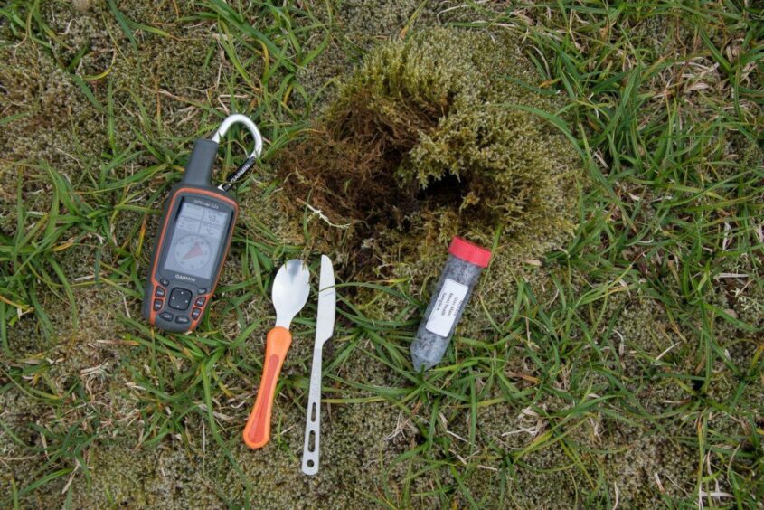 Soil sample kit on the grass