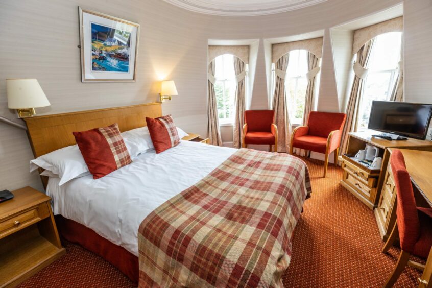One of The Atholl Hotel's plush bedrooms.