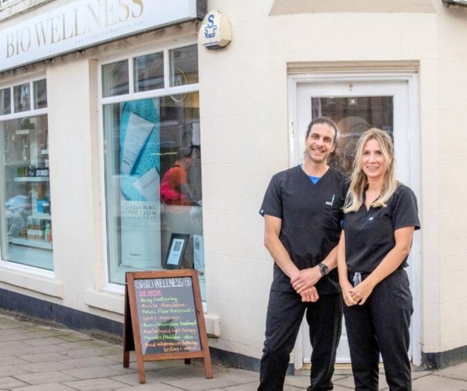 Bio Skin and Wellness owners stood outside of their clinic.