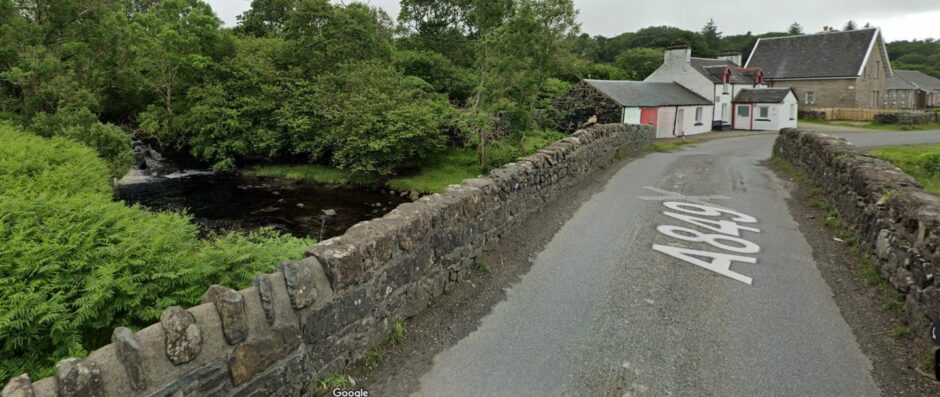 Pennyghael Bridge on Mull is to be replaced. The bridge is in the picture will houses and a community centre in the distance. 