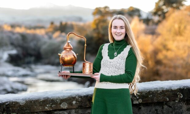 Ciara Bow and her current still. Image: Gledfield Distillery