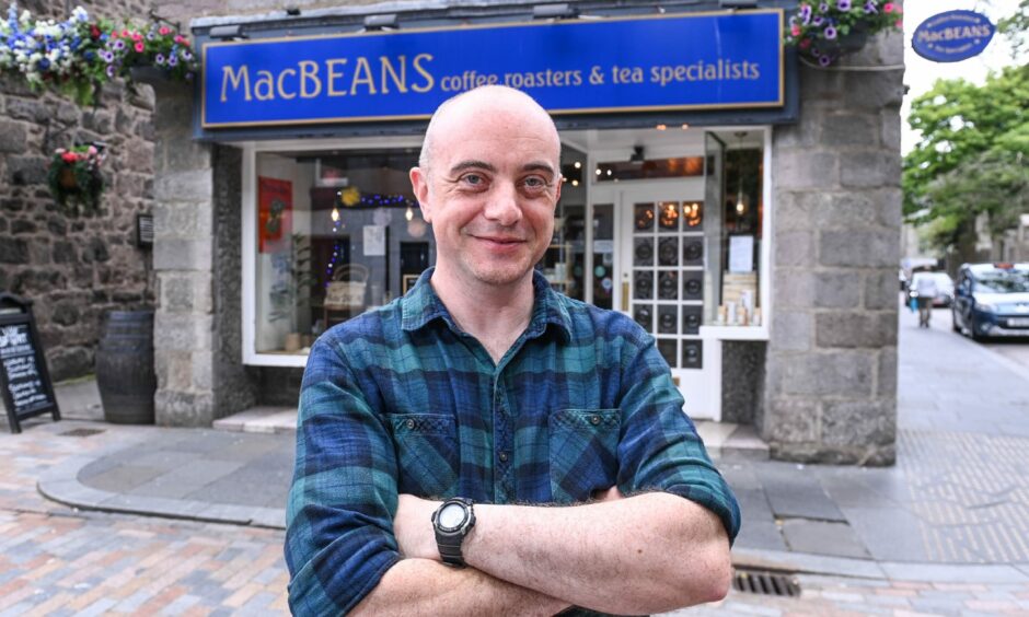 Brian Milne standing outside Macbeans in Aberdeen