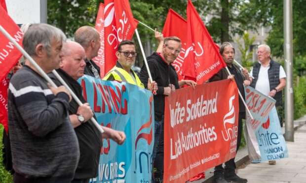 Unite members and reps gathered outside Harlaw Academy over pay dispute.