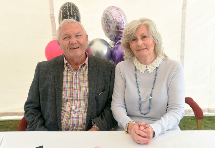 Betty and Adam Craigmile celebrating their 60th wedding anniversary, and Betty's 80th birthday, in 2019. Picture by Heather Fowlie / DC Thomson.