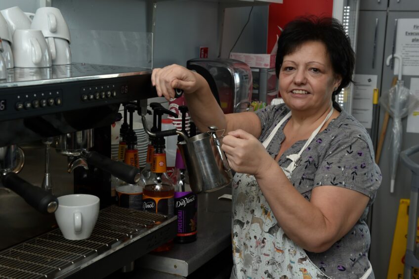 Barking Mad cafe owner Val Inglis making coffee.