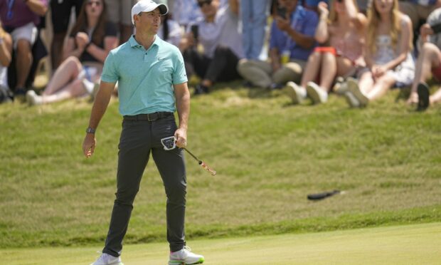 Rory McIlroy shows his disappointment after missing a putt at the 2023 US Open.