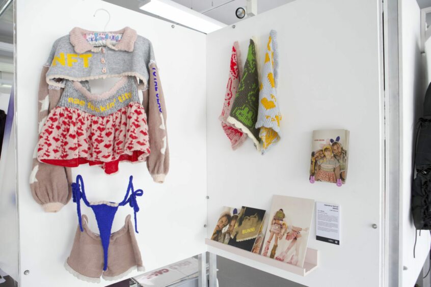 Knitted clothing on display at the degree show 