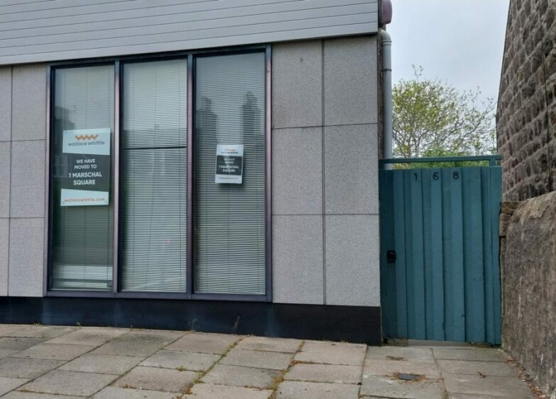 the new flat in Aberdeen's west end with a gate next to it with the number 168 on it.