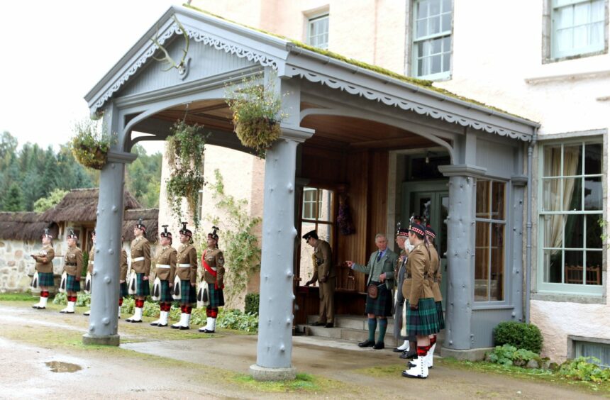 King Charles, then the Duke of Rothesay, presented service medals at Birkhall in 2012.